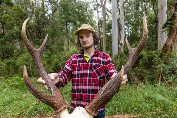 Deer hunter Nick Barlow who shoots deer for farmers affected by the invasive species.