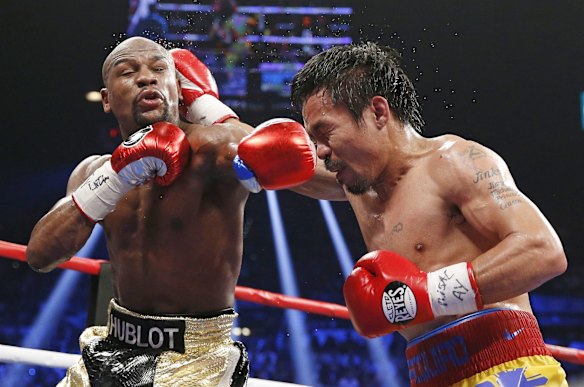 Floyd faces off with Manny Pacquiao.