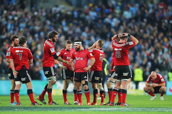Downcast: Crusaders players look dejected after  the Super Rugby final loss to the Waratahs at ANZ Stadium.