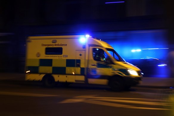 An ambulance heads North from London Bridge.