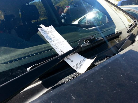 The government will explore means testing for parking fines. 