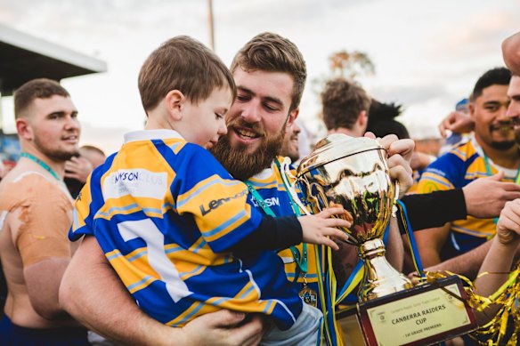 Woden Valley Rams captain Jeffrey Morgan celebrates their win.
