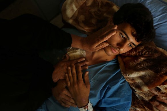 Supreme Council for the Islamic Revolution in Iraq volunteer fighter, Ismail Abdul Hassan 17 recovers in hospital in Baghdad, from wounds caused by an IED explosion, whilst fighting against ISIS.