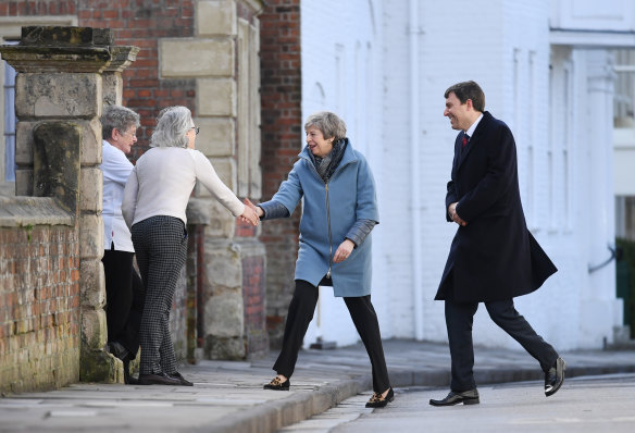 Theresa May greets local residents during a visit to Salisbury. 