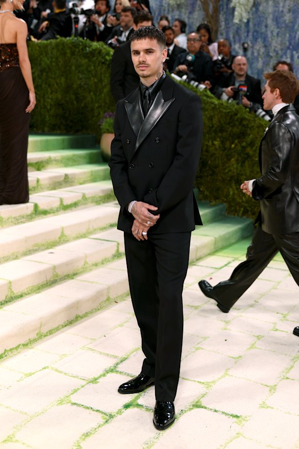 Romeo Beckham in Burberry.
