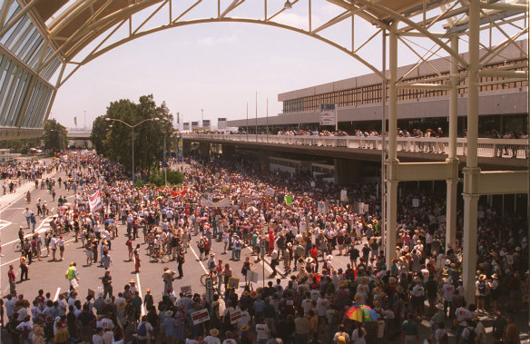 Controversial: thousands of protestors at Sydney International Airport on December 17, 1994