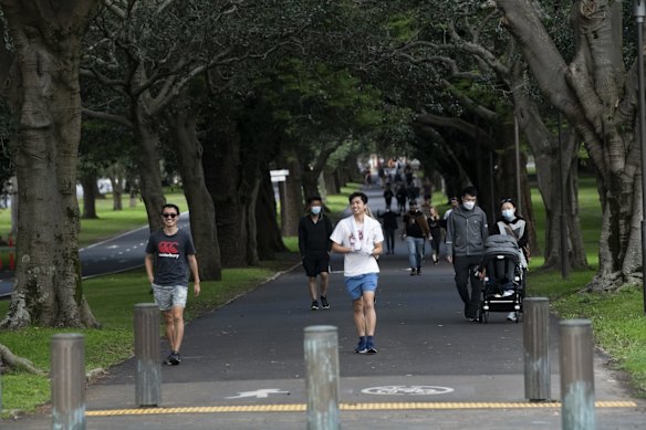 People exercising around Moore Park during Sydney's COVID lockdown.
