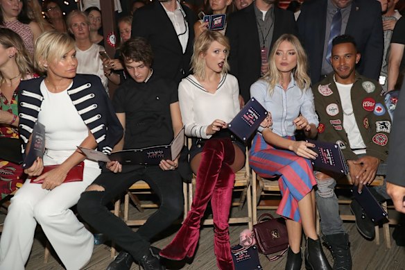 If it hasn't already been proven, Taylor Swift doesn't feel the heat. Now there is photographic evidence. Any other human wearing thigh high velvet boots in 30 degree heat and 100 per cent humidity would have melted. Not Swift in Boots, who made her first pubic appearance since the Kimye/Hiddleswift palava with Yolanda Hadid, Anwar Hadid, model Martha Hunt and Lewis Hamilton at the #TOMMYNOW Women's Fashion Show.