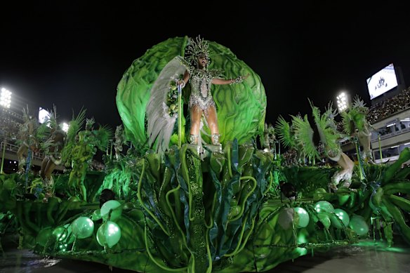 Performers from the Imperio Serrano samba school parade during Carnival celebrations at the sambadrome in Rio de Janeiro, Brazil.
