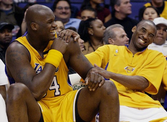 2003: Los Angeles Lakers Shaquille O'Neal, left, and Kobe Bryant share a laugh on the bench while their teammates take on the Denver Nuggets during the fourth quarter at Staples Center in Los Angeles.