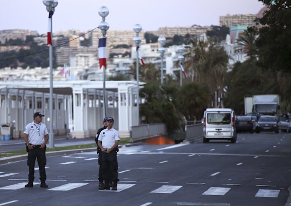 French police patrol near the scene.