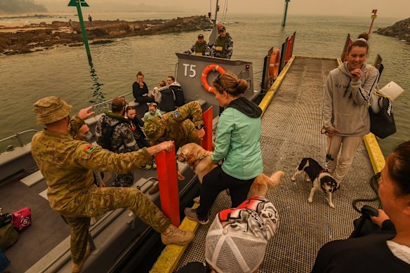 Mallacoota Evacuations of people stranded after the bushfires that ravaged the town on December 30 2019. Evacuated by army personnel to the HMAS Choules Friday 3rd January 2020.