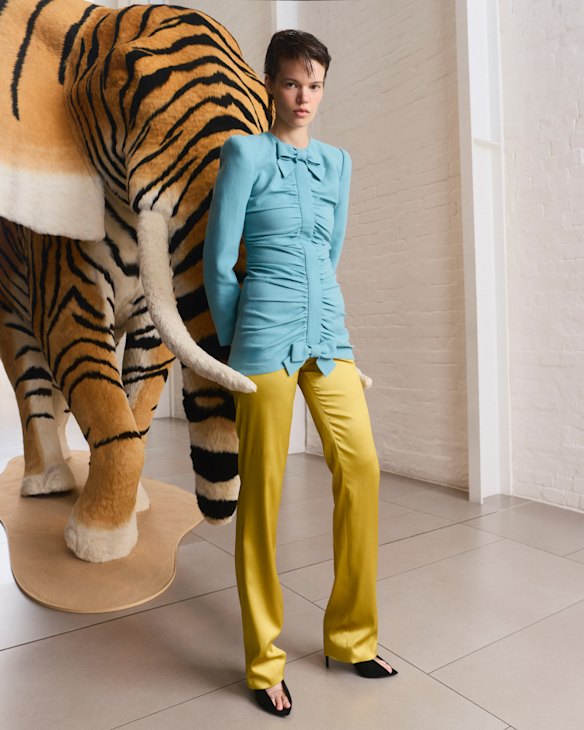 Valentino jacket, trousers and “Révélé” pumps.