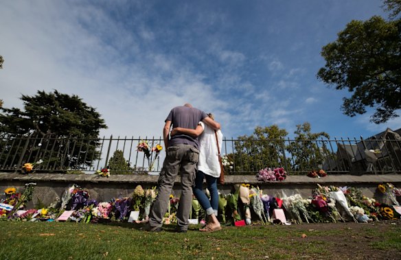 A floral tribute on the fence of the Christchurch Botanic Gardens.