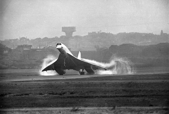 Smoke and water stream from the Concorde on the moment of impact at Sydney Airport. “Sun” man Purcell used a Nikon camera with a 300mm lens and two-times converter for this spectacular snap. June 17, 1972