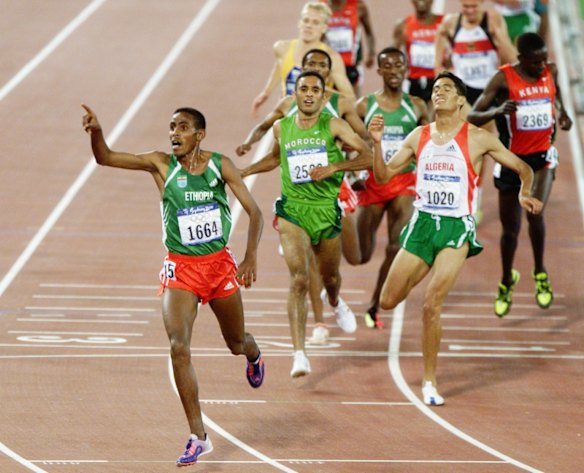 Millon Wolde of Ethiopia wins the men's 5000m.