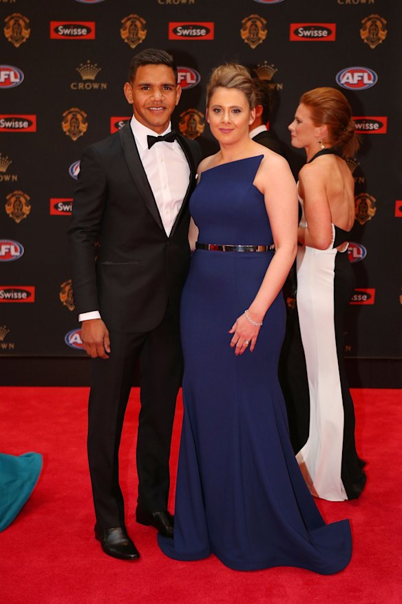 Neville Jetta of Melbourne Demons and Samantha Jetta pose on the red carpet ahead of the 2016 AFL Brownlow Medal count at Crown Palladium on September 26, 2016 in Melbourne, Australia.