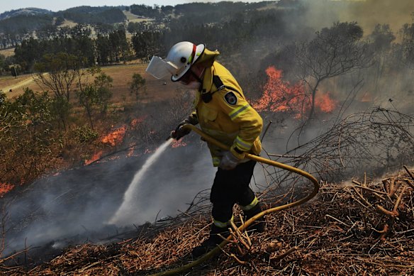 Brigades defending properties in Hillsville days after the destructive fire started.
