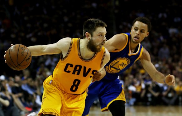 Matthew Dellavedova's game-three starring role: Dellavedova drives against Steph Curry.