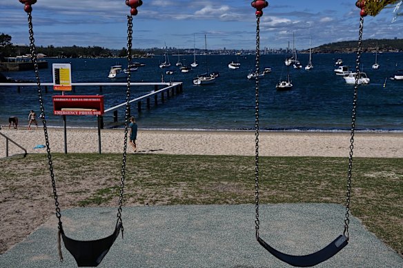 A quiet Little Manly beach due to Covid restrictions. The northern beaches' actual beaches are technically open, but there are no red and yellow flags so swimming is discouraged. Cooler weather conditions has helped keep people off the sand.