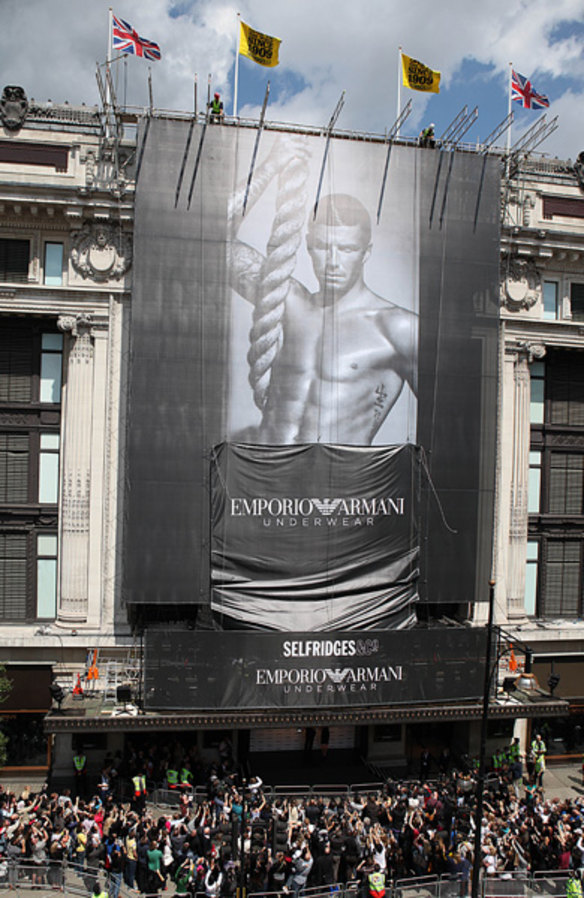 The unveiling ... Even a tube strike couldn't stop David Beckham's adoring fans from attending the launch of his latest campaign for Emporio Armani.