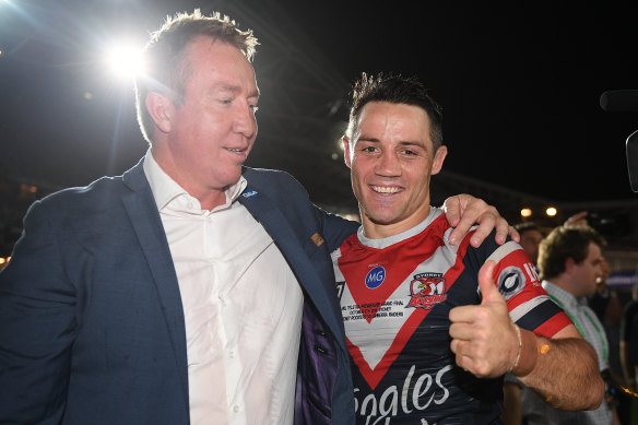 Trent Robinson and Cooper Cronk of the Sydney Roosters celebrate grand final success again.