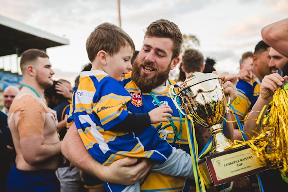 Woden Valley Rams captain Jeffrey Morgan celebrates their win.
