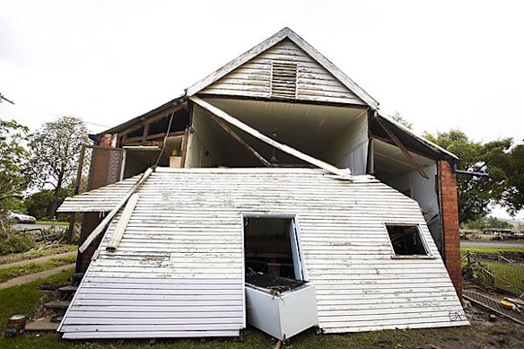 Emergency services search for bodies in the town of Grantham, in the Lockyer Valley, which was devastated by a sudden flood on January 10. Photo: Dean Saffron