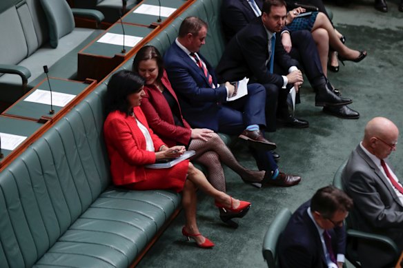 Liberal MP Julia Banks and Minister for Jobs, Industrial Relations and Women Kelly O'Dwyer during a division in the House of Representatives at Parliament House in Canberra on Monday 17 September 2018.  Photo: Alex Ellinghausen