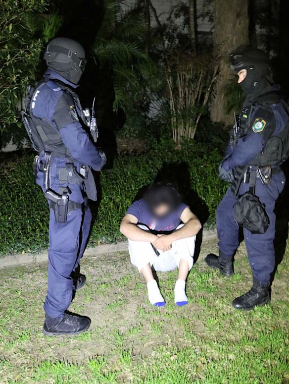 Supplied image of police during the execution of search warrants across Sydney's north-west suburbs.