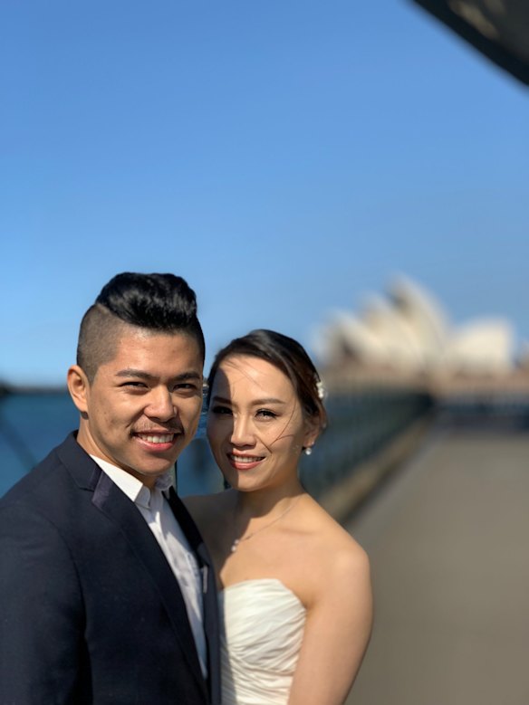 A newly married couple under the harbour bridge in Sydney. 
This frame is the result of using the 'depth Control' feature after the photo was taken. It allows for background blur.

Taken with the Apple Iphone Xs Max
