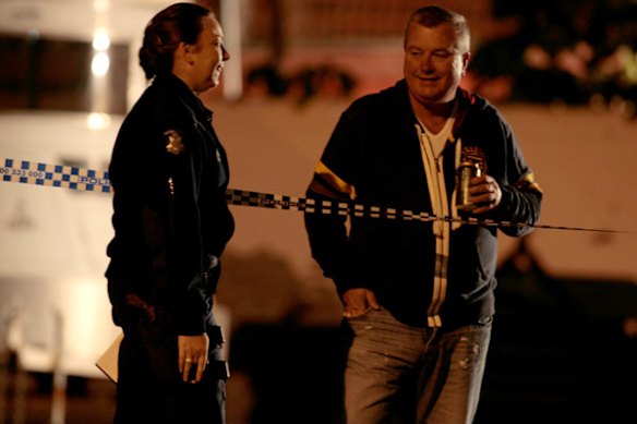 Des Moran stands in the drive way of his home after being shot at earlier in the evening, March 17 2009.