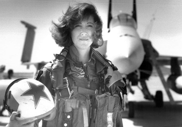 Top gun: Tammie Jo Shults, one of the first women to fly navy tactical aircraft,  in front of an F/A-18A with Tactical Electronics Warfare Squadron (VAQ) 34 in 1992. She was the pilot of the Southwest plane that made an emergency landing after an engine explosion.