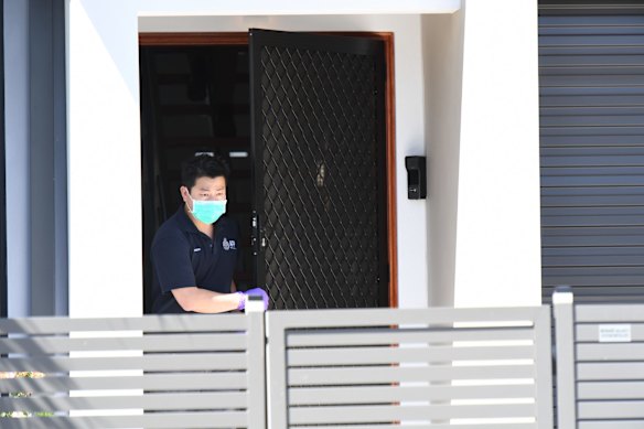 NSW Police forensic officers at the house.