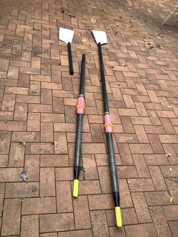 The oars (pictured) washed up on the banks of the Brisbane River on Sunday.