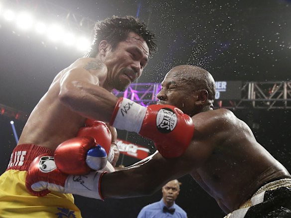 Manny trades blows with Floyd.