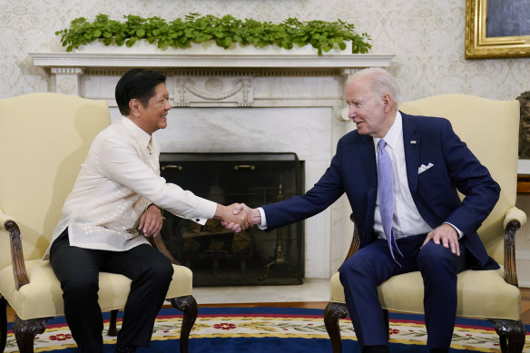 President Joe Biden shakes hands with Philippines President Ferdinand Marcos jr as they meet in the Oval Office of the White House.