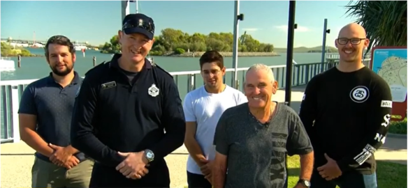 Acting Senior Sergeant Brad Foat and Peter Corke (front) speaking on the Today show with the three kayakers.