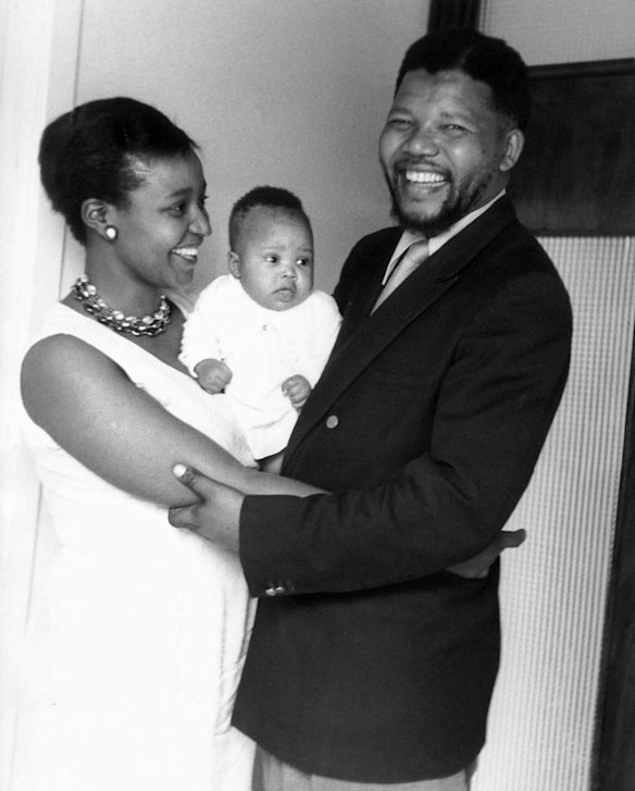 Nelson and Winnie Mandela show off their firstborn daughter, Zindzi, at their home in Orlando West, Soweto in 1961.