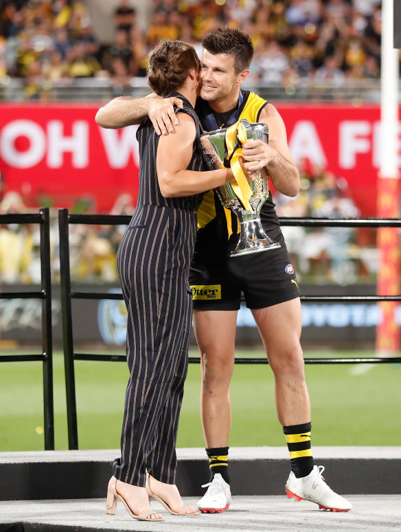 Ash Barty presents the cup to Trent Cotchin of the Tigers after the 2020 Toyota AFL grand final.