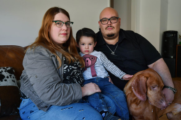 Boris, Emma and two-year-old Maxton Siguenza with their dog Archie. Thieves snuck into their home through a doggy door and stole two cars in an aggravated burglary on September 13.