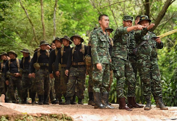 Thai army soldiers at the base camp where the rescue operations are being planned for 12 boys and their soccer coach who have been trapped inside Tham Luang cave for 11 days.