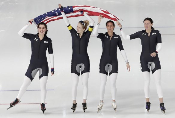 Heather Bergsma, Mia Manganello, Brittany Bowe and Carlijn Schoutens celebrate their bronze medal in the Women's Speed Skating Team Pursuit final B competition at the Gangneung Oval during the PyeongChang 2018 Olympic Games.