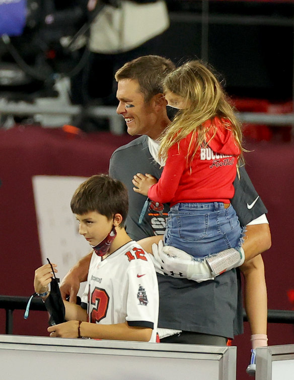 Tom Brady #12 of the Tampa Bay Buccaneers celebrates with his family after winning Super Bowl LV at Raymond James Stadium.