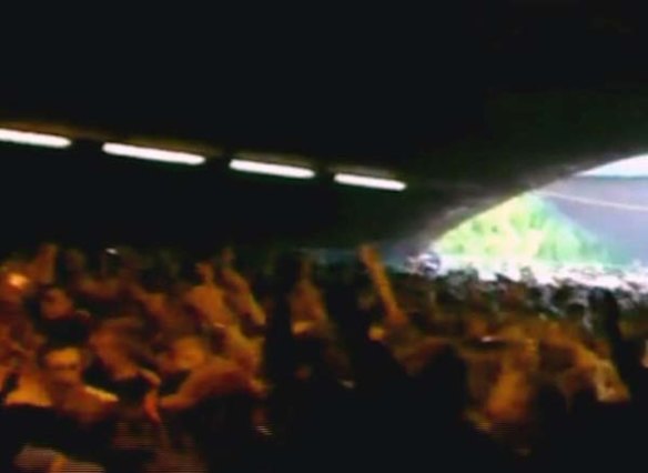 In this image taken from an amateur video, people are seen inside a tunnel moments before a stampede broke out at this year's Love Parade.