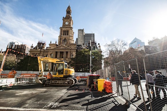 Construction of the light rail continues outside Town Hall on George Street, Sydney.
