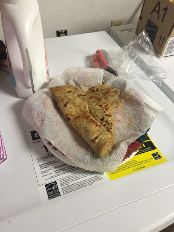 A plate of half-eaten flat bread.