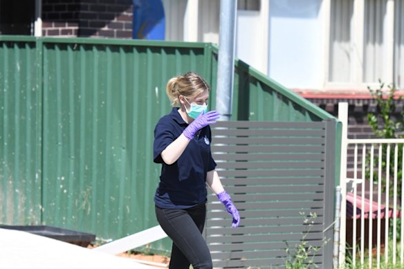 NSW Police forensic officers at the house.