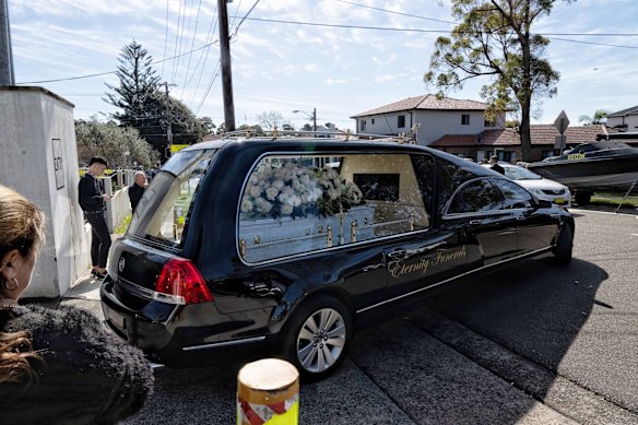 The hearse arrives for Lametta Fadlallah's funeral,