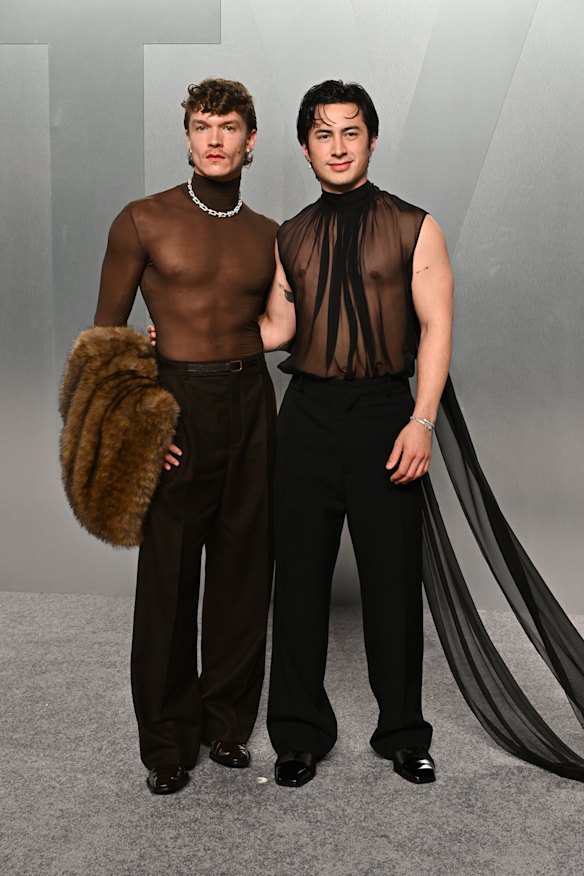 Connor Storrie and Hudson Williams arrive at the Vanity Fair Oscar Party.